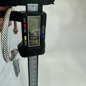 Classic Cable Bracelet
Sterling Silver with 14K Yellow Gold and Gold Domes, 5mm